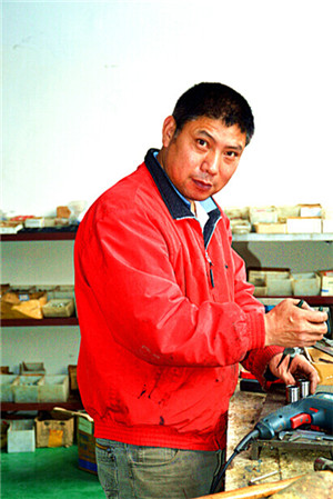 Our happy worker Mr. Jiang